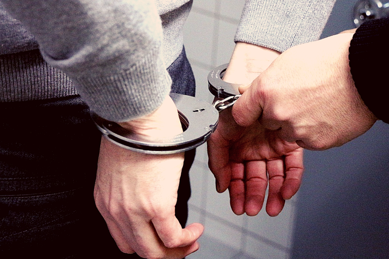 Man in handcuffs close up